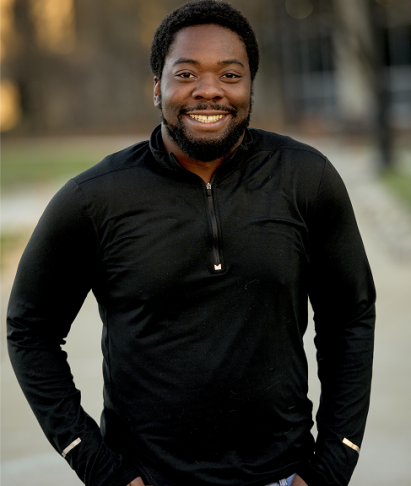 vertical-shot-attractive-african-american-male-smiling-camera